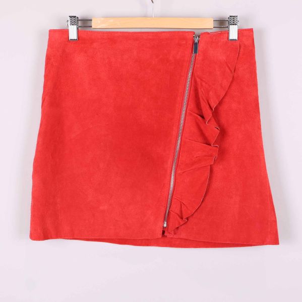 Framsida av kjol med volang