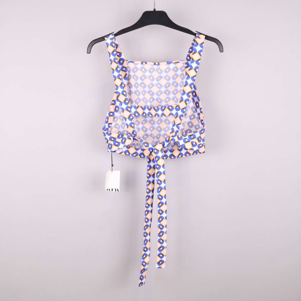 Bakifrån syn på toppen