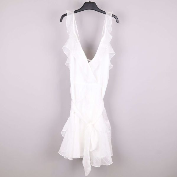 Vit klänning med volanger