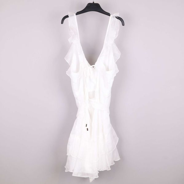 Knytband på baksidan