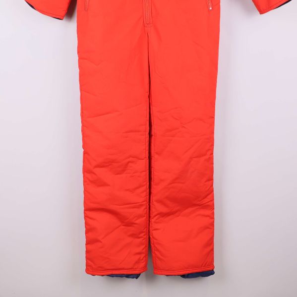 Nederdel av overallens ben, lätt utsvängda