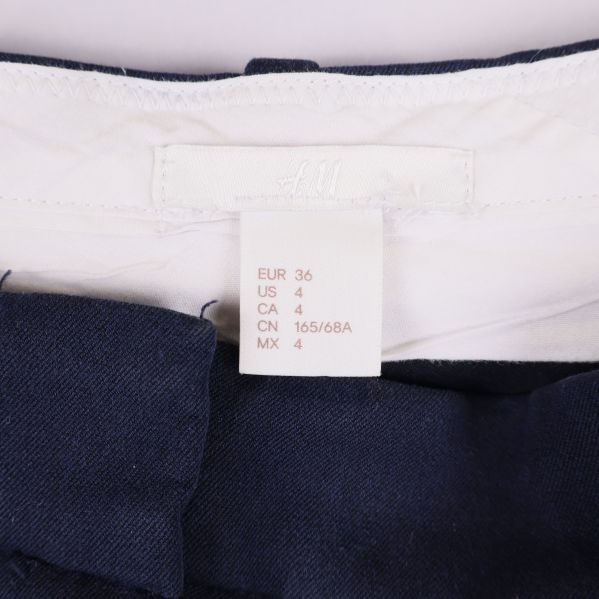 Storleksetikett på insidan av byxorna från H&M, EUR 36