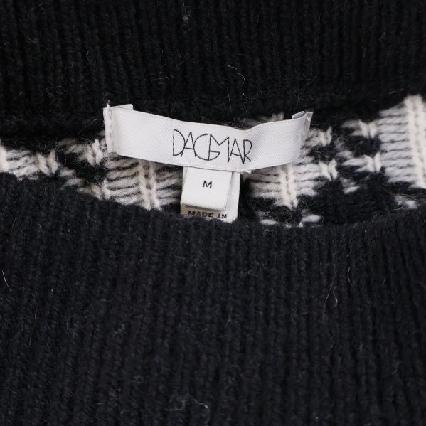 Dagmar-märkesetikett och storlekslapp i midjan på kjolen