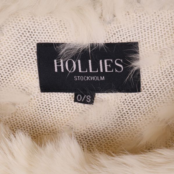 Hollies varumärkesetikett med onesize-markering