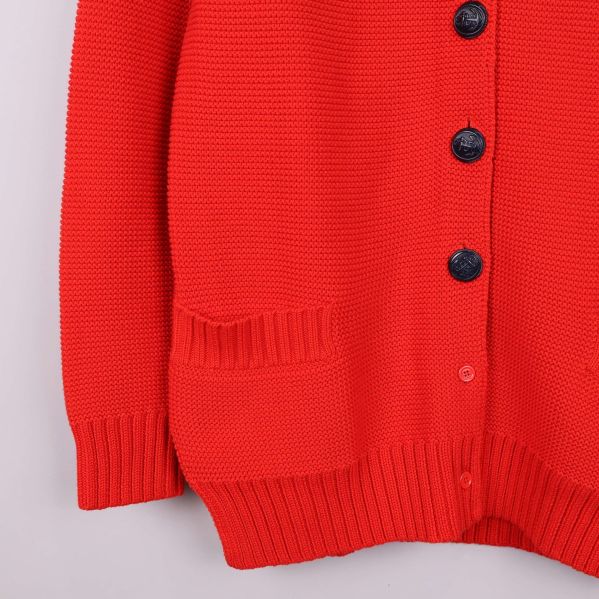 Koftans nedre del med fickor och knappslå