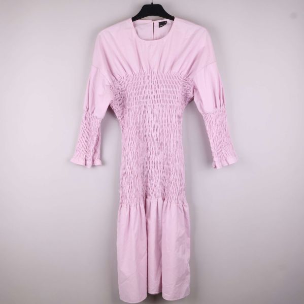 Framifrån med smockdetaljer