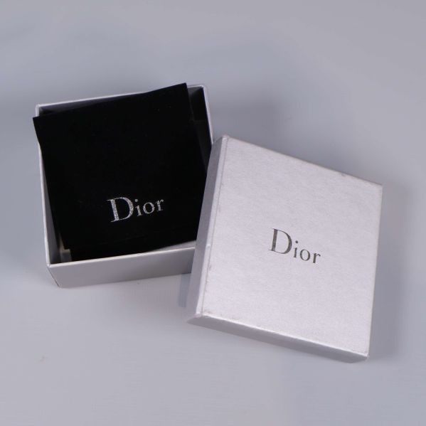 Grå Dior ask med svart tygfodral inuti