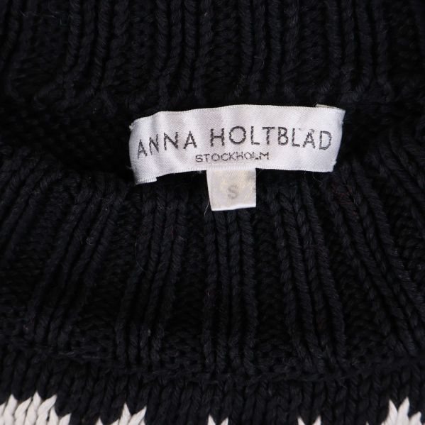 Namnetikett med Anna Holtblad och storlek S