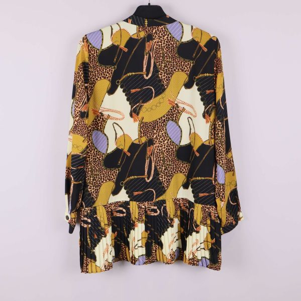 Tunika med grafiskt mönster i svart och gula toner, baksida