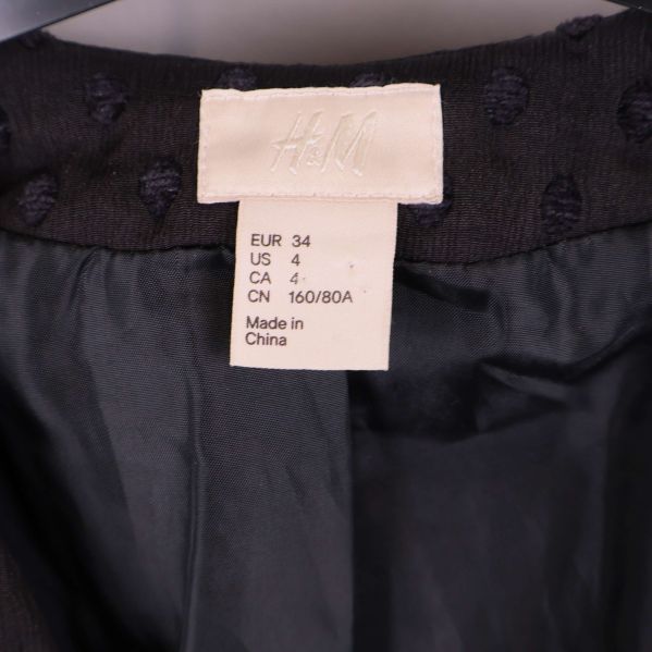 H&M storleksetikett med information om storlek