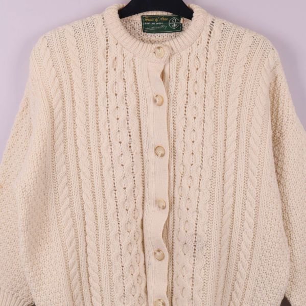 Överdel av kofta med rund hals och kabelmönster