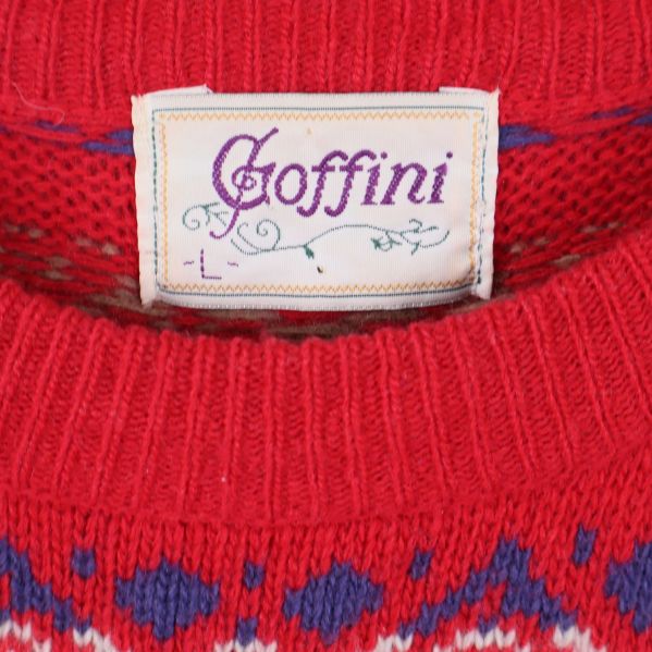 Närbild på etikett med märket Goffini i halsen