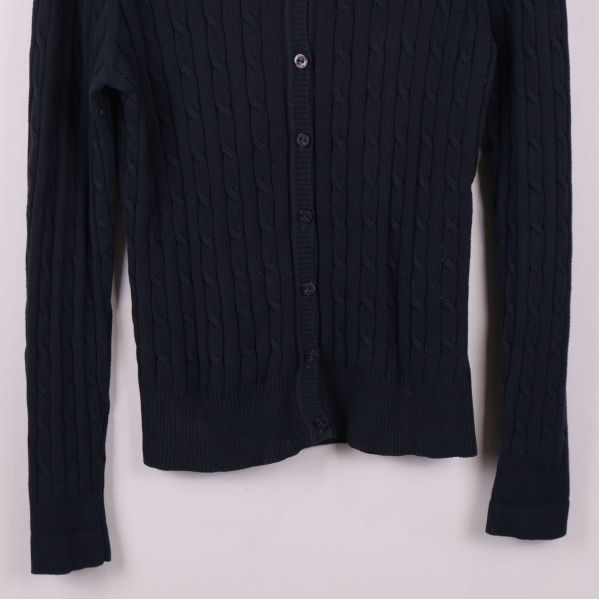 Nedre delen av kabelstickad cardigan med ribbad kant