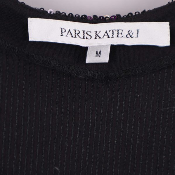 Närbild på etikett Paris Kate & I och storlek M