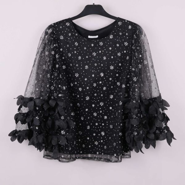 Svart topp med paljetter och vida ärmar