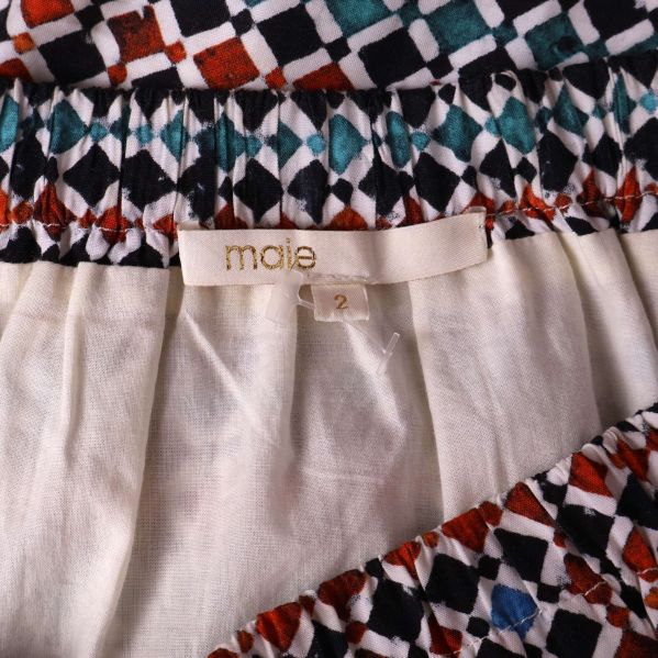 Maje etikett och logotyp