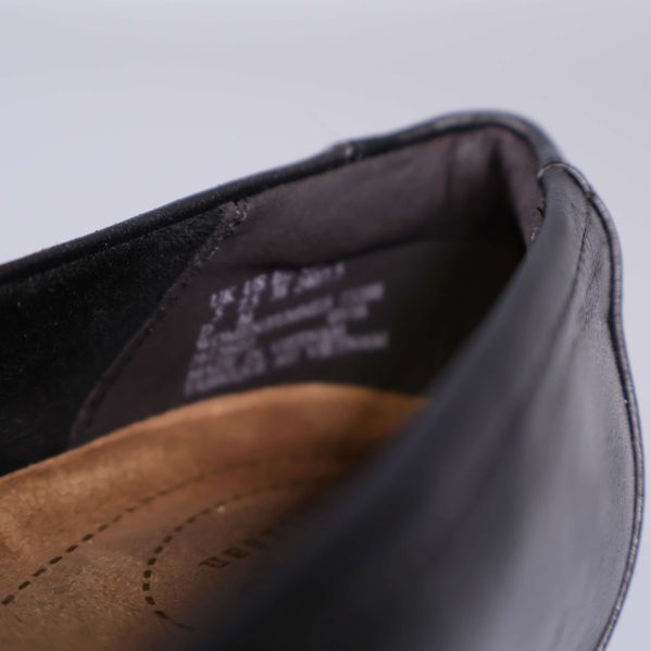 Närbild på insida av sko med materialspecifikation