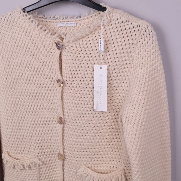 Detaljer av knappar och fickor