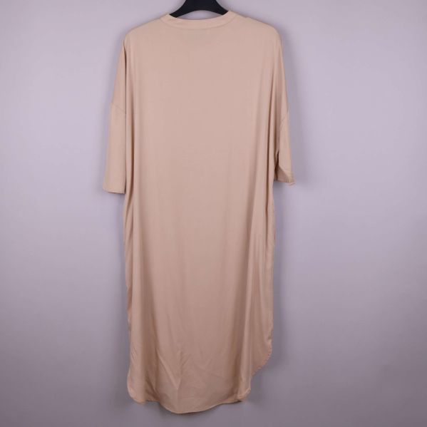 Skjortans nederdel med fläckar