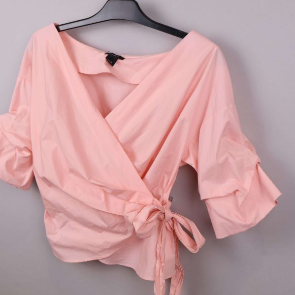 Detaljer av blusens design