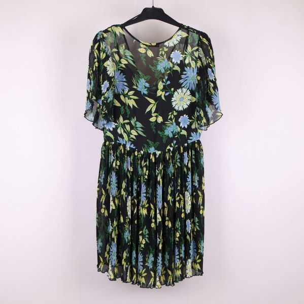 Bakifrån blommigt mönster