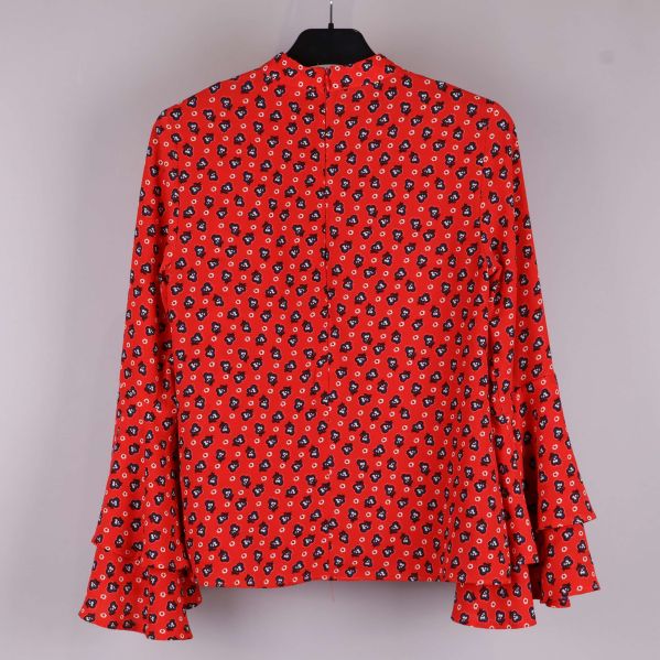 Blusens silhuett bakifrån