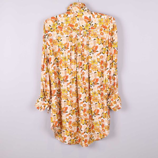 Baksida av långskjorta