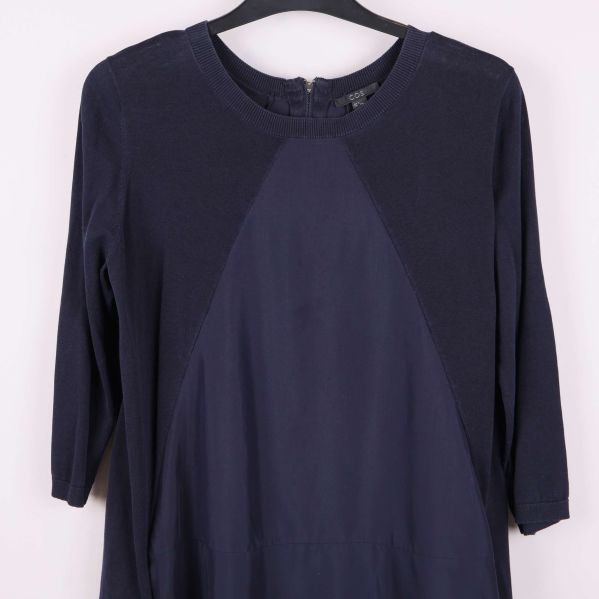 Kontrasterande material på överdelen