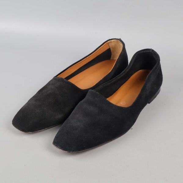 Svarta ballerinas sida