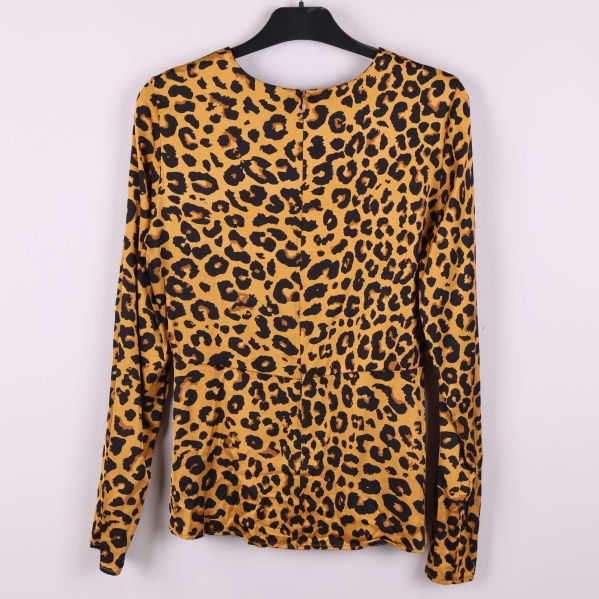 Baksida av leopardtopp