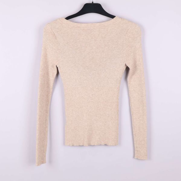 Baksida ribbstickad tröja