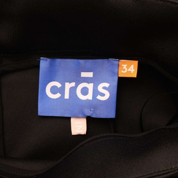 Crās etikett med storlek 34