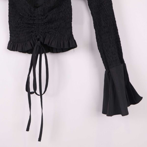 Ärmdesign och knytband