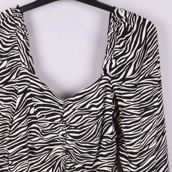 Storleksetikett med märkeslogga