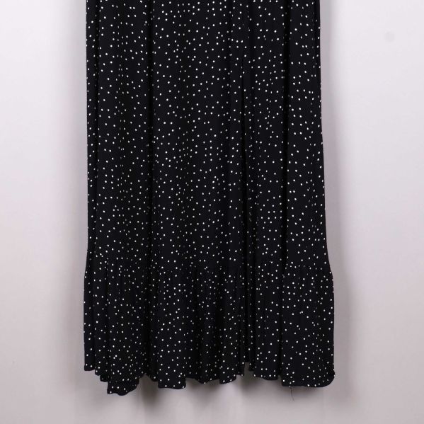 Klänningens svängande nederkant