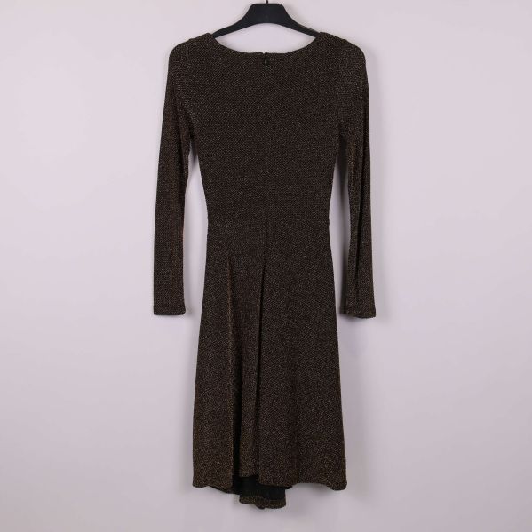 Klänning med lång ärm och glitter på galge bakifrån