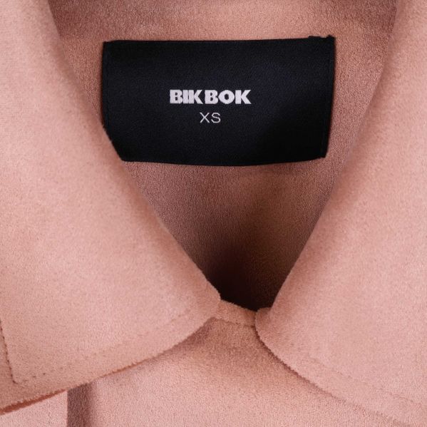 Dragkedja och axelklaff