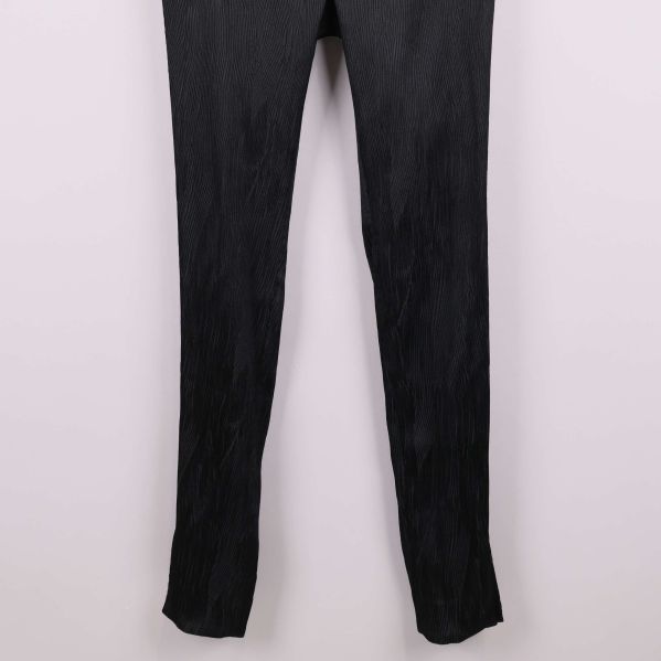 Närbild på byxben och strukturmönster