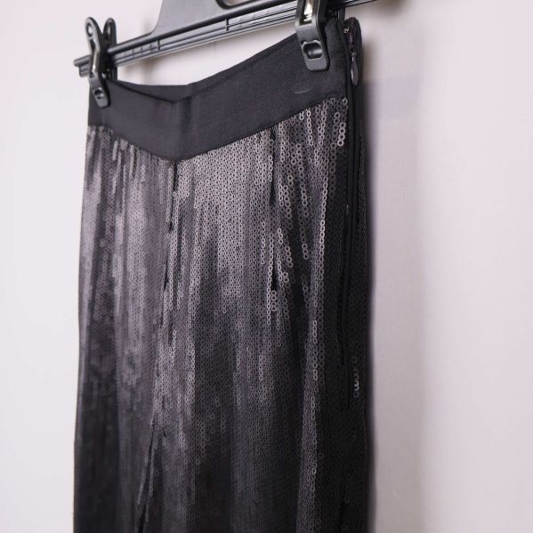 Närbild på lyster och struktur i paljettmaterialet