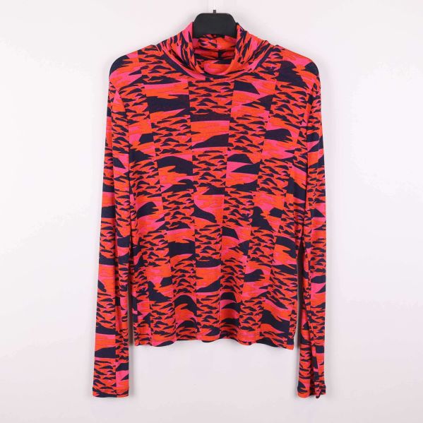 Färgglad grafisk polotröja fram