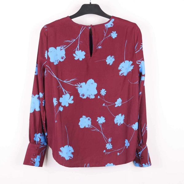 Baksida med knappdetalj