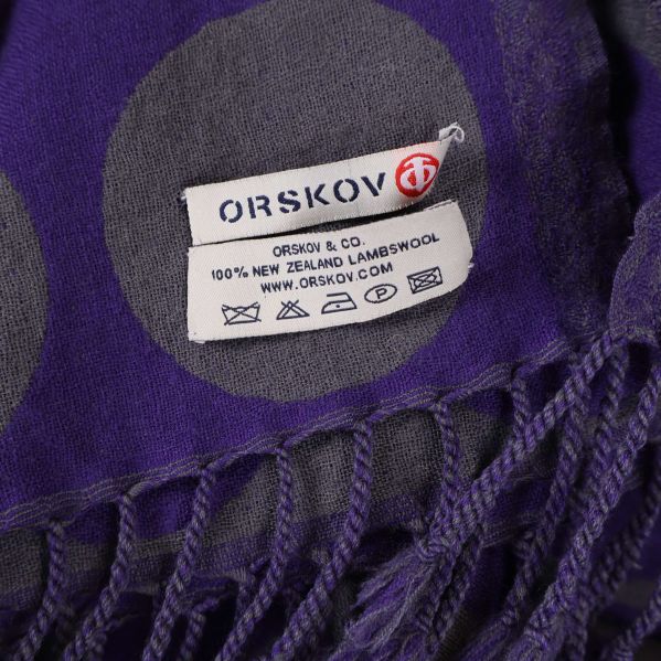 Etikett med texten 100% New Zealand lammull från Orskov