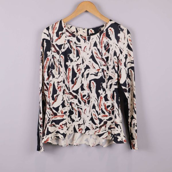 Blus med grafiskt mönster