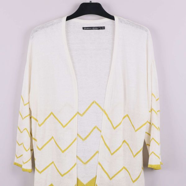 Övre delen av kofta med öppen fram och zigzagmönster