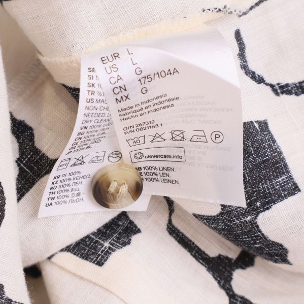 Material- och tvättrådsetikett med storleksmärkning L