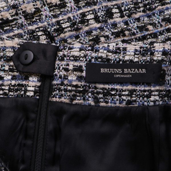 Närbild på etikett Bruuns Bazaar Copenhagen invändigt