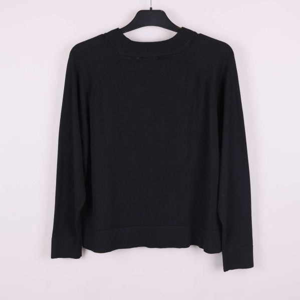 Baksida av tröjan i helbild