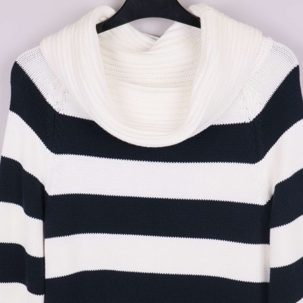 Detalj av sjalkrage och stickning