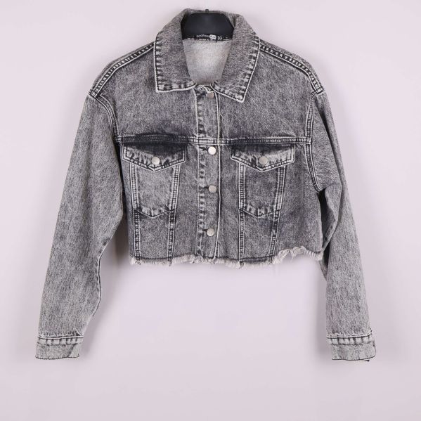 Framsidan med rå kant och fickor