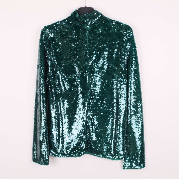 Paljettopp med diskret dragkedja bak